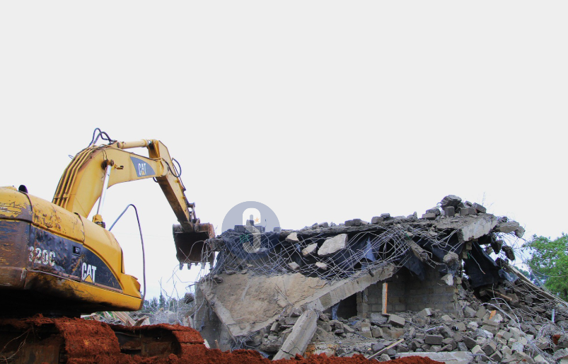Bulldozer demolishes a palatial home in Marurui on a 300-acre disputed land, May 5, 2026. /EZEKIEL AMING'A