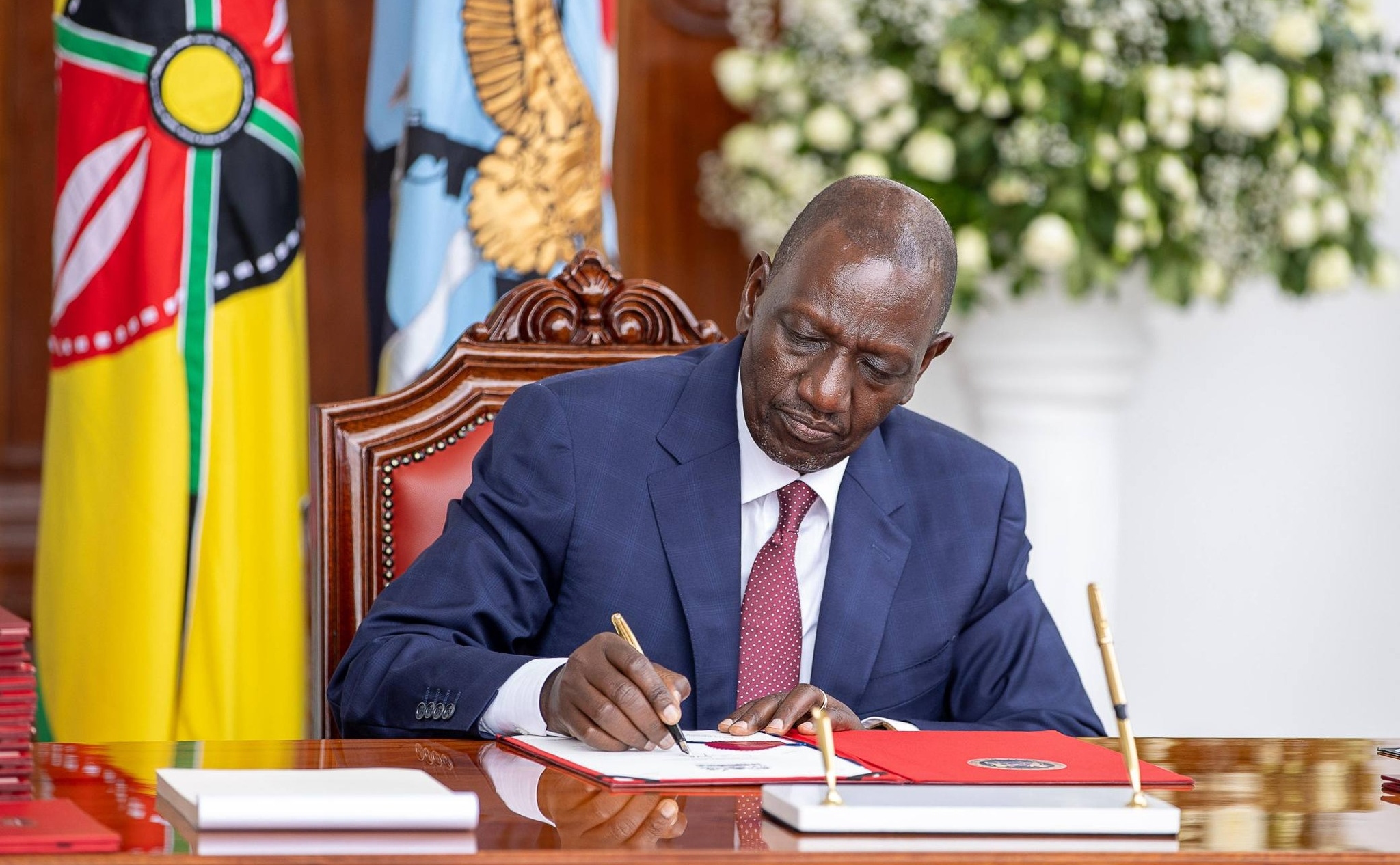 Ruto Signs Landmark Investment Triple-Bill