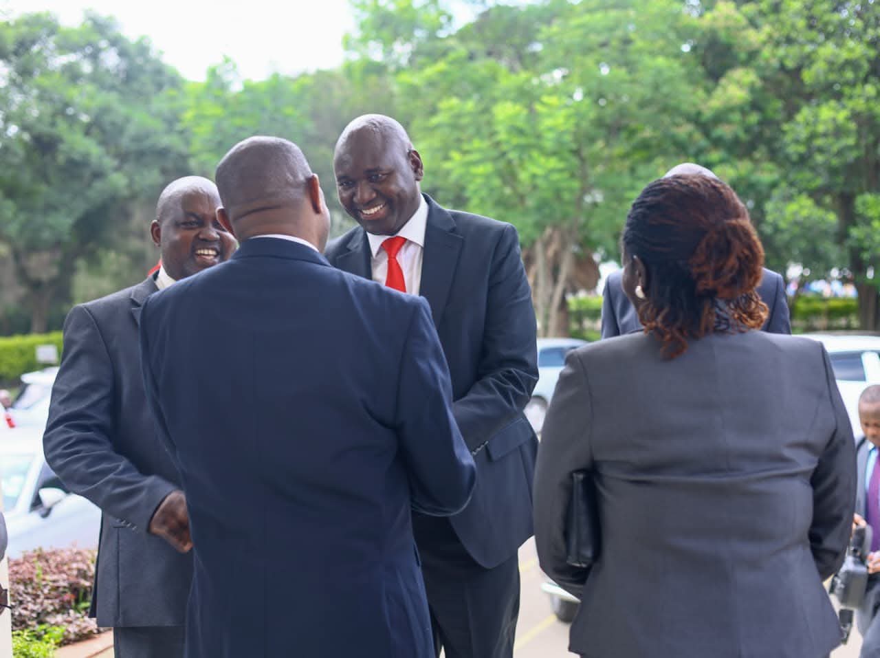 Basic Education PS Prof. Julius Bitok (facing camera in red tie) being received at the Nakuru High School, where he attended the Elimu Mashinani convention.