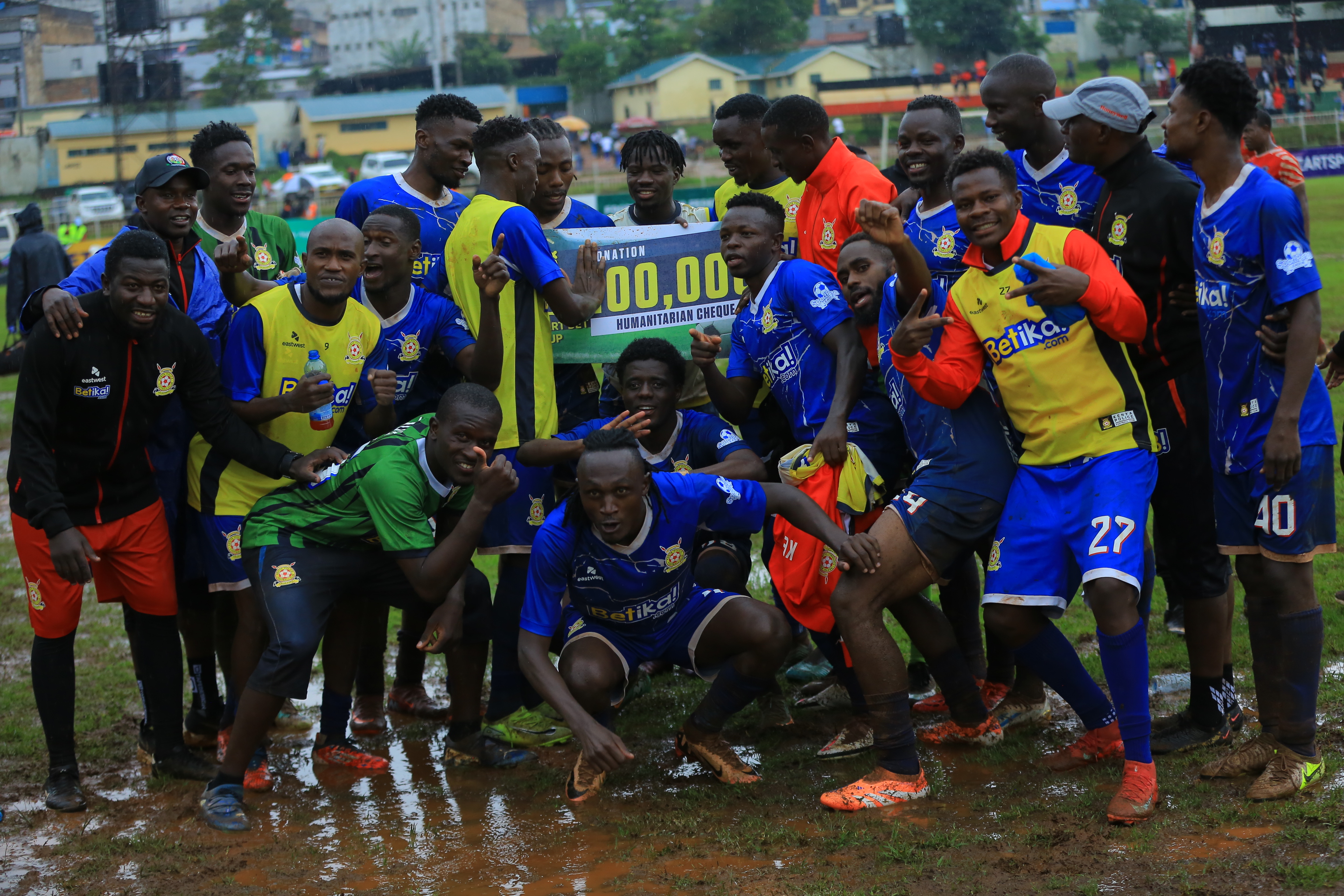 Kenya Police players celebrate with man of the match Aboud Omar who was awarded Sh100, 000 for charity
