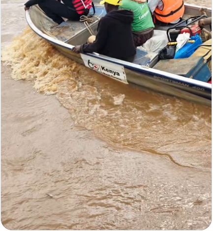 Responders from the Kenya Red Cross prepared their mission. Equipped with ropes and a speedboat, they moved quickly into the turbulent waters.