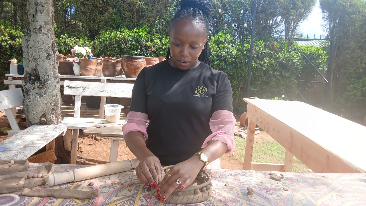 Wanjiku Muturi, a working mother and healthcare professional, and a well-known influencer, attends a pottery session for mothers in Laikipia on Saturday
