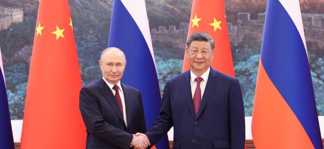 Xi basks in spotlight as he hosts Putin days after Trump