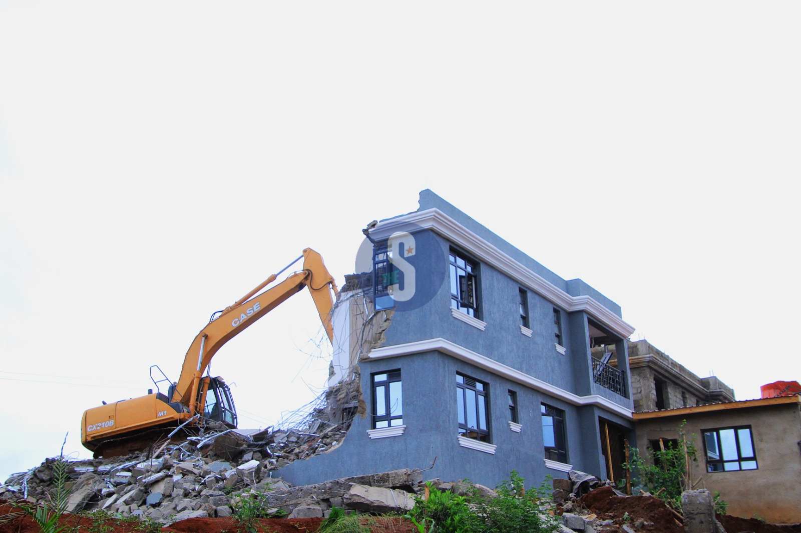 HOUSE UNDER DEMOLITION