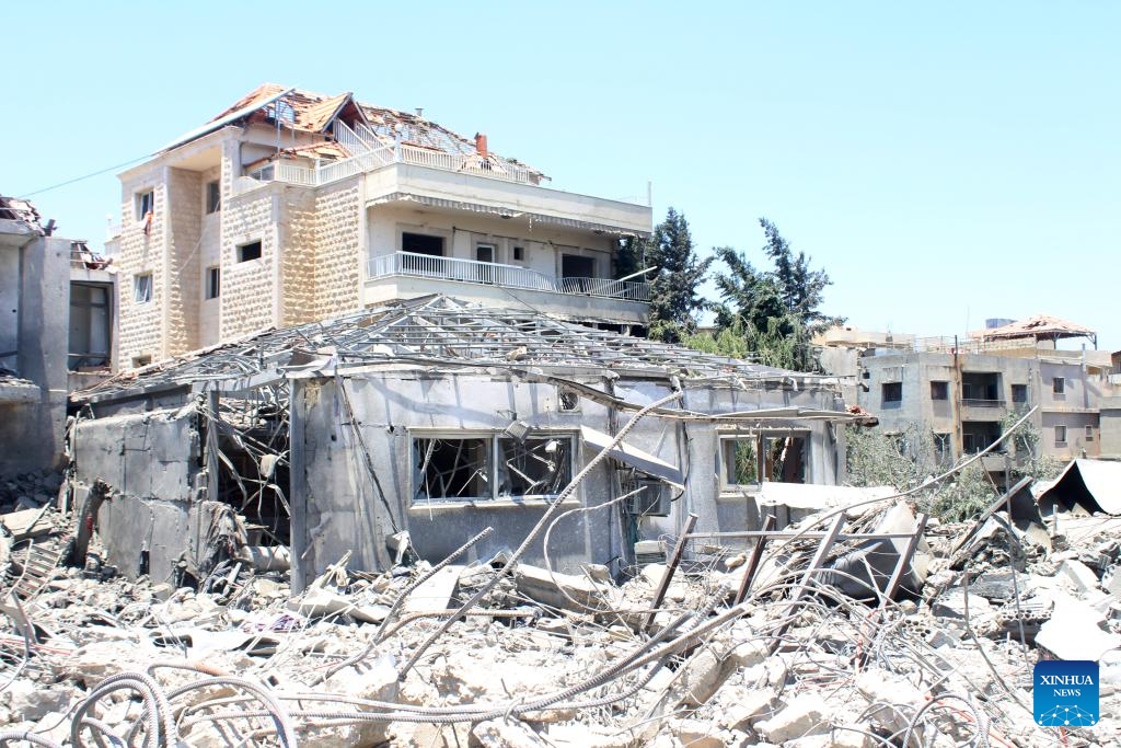 This photo shows a building destroyed by an Israeli airstrike in Kafr Kila, Lebanon, June 24, 2024. A Lebanese civilian was killed, and a civil defense member wounded on Monday in Israeli airstrikes that targeted several areas in southern Lebanon, Lebanese military sources told Xinhua. Israeli drones and warplanes carried out eight air strikes on six towns and villages in the border area in southern Lebanon, destroying dozens of houses and infrastructure, according to the sources. (Photo by Taher Abu Hamdan/Xinhua)