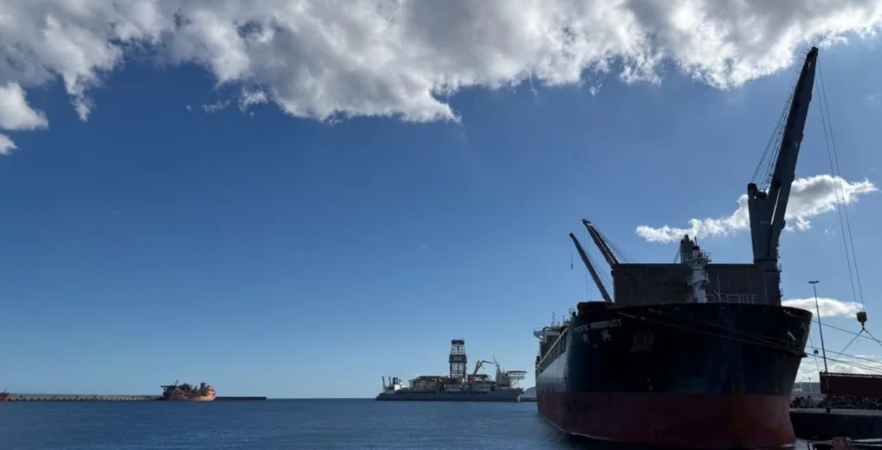 A cargo ship sits in the industrial port of Granadilla, Tenerife