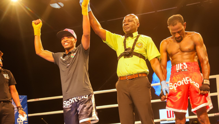 Amos Amenya celebrates after beating Abdul Hakim via TKO in their Super-Featherweight contest during the SportPesa Boxing in Nairobi/HANDOUT