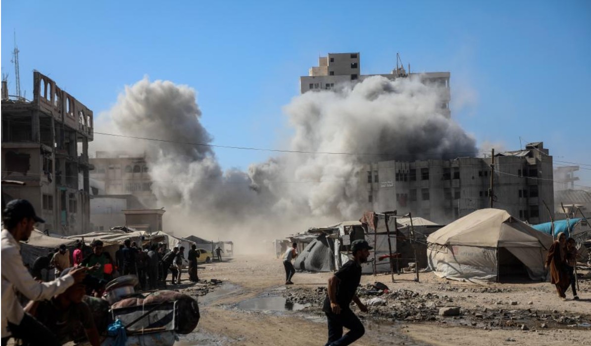Smoke raises from the "Vision" tower following an Israeli airstrike in Gaza City, on Sept. 8, 2025. Israeli forces intensified airstrikes on Gaza City on Monday, including the demolition of the "Vision" tower, a 14-story office building, in the western part of the city. (Photo by Rizek Abdeljawad/Xinhua)