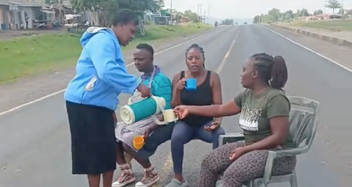 Women sip tea on Nakuru highway during fuel demos
