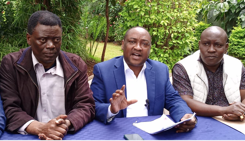 The National Liberal Party leader Dr Augustus Muli (centre) at a past press briefing/HANDOUT