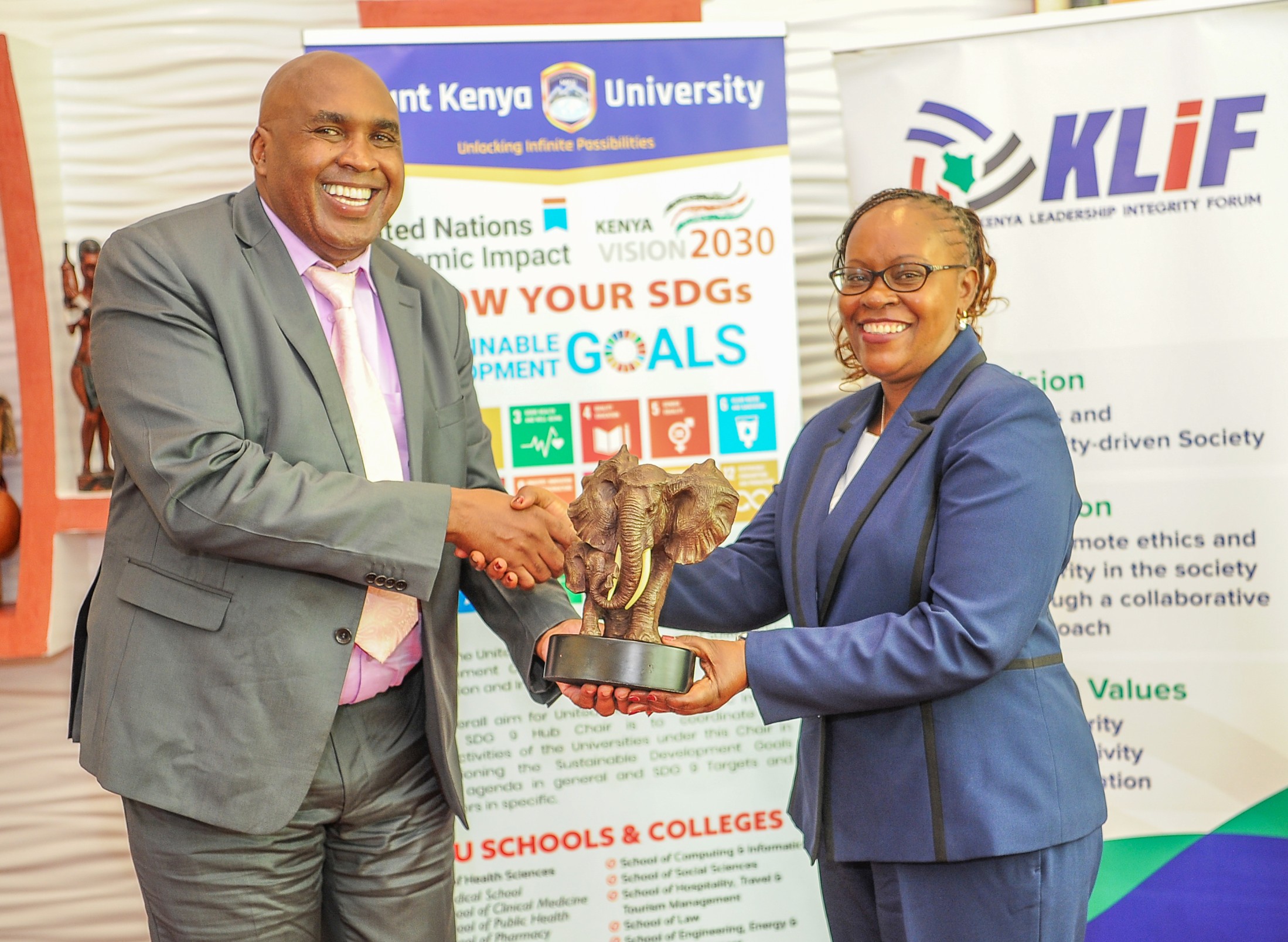Mount Kenya University Chairman and Founder Simon Gicharu presents a token of appreciation to Dr. Monica Wanjiru Muiru, Vice Chairperson of the Ethics and Anti-Corruption Commission (EACC), during a visit by the EACC delegation to MKU. The engagement marked the launch of a partnership between MKU and EACC aimed at harnessing the innovation and energy of young people to promote a strong culture of integrity and accountability. PhOTO, JOHN MUCHUCHA/ poll