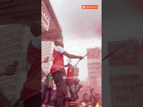Geoffrey Mosiria at Archives as ARSENAL FANS celebrate EPL TROPHY AFTER 22 years