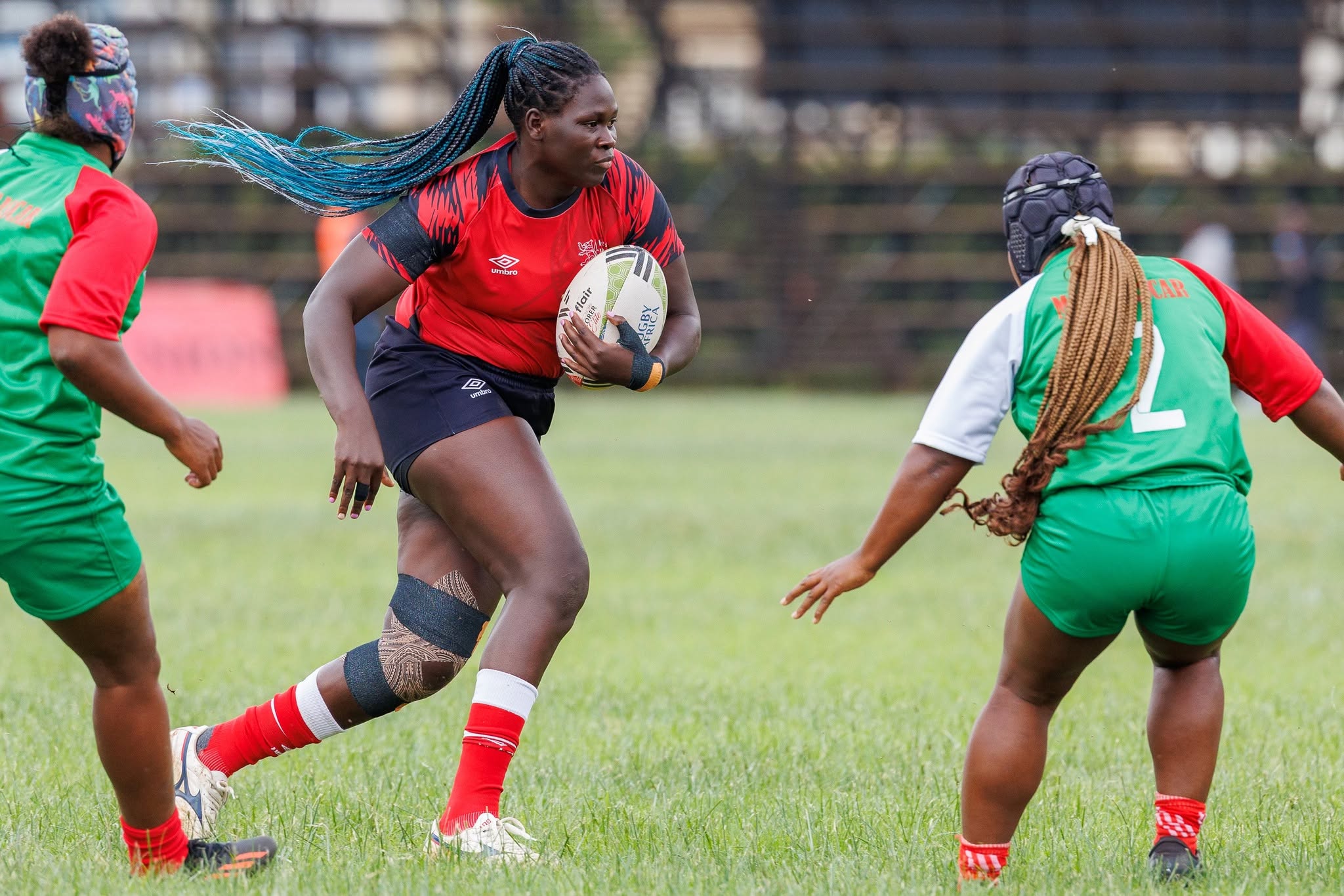 Kenya Lionesses lock Phoebe Otieno in action against Madagscar