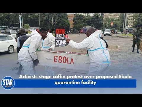 Activists stage coffin protest over proposed Ebola quarantine facility