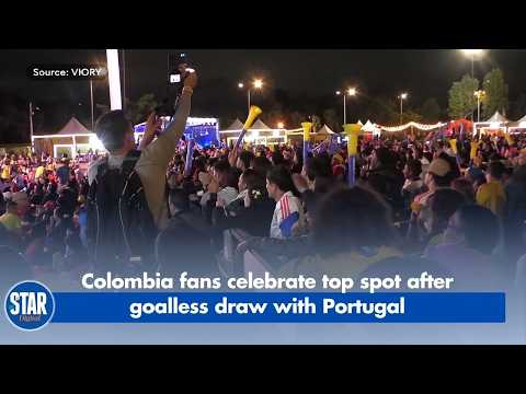 Colombia fans celebrate top spot after scoreless draw with Portugal