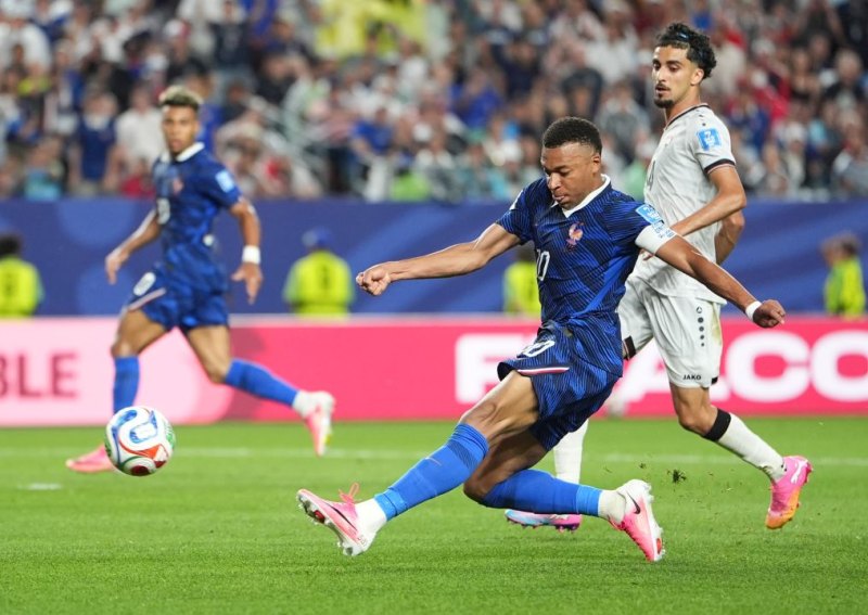 Mbappé storms into World Cup history