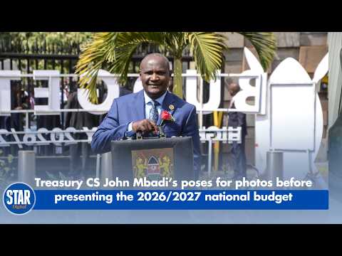 Treasury CS John Mbadi’s poses for photos before presenting the 2026/2027 national budget