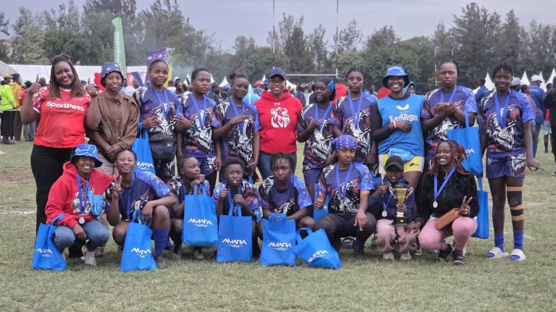 Kiambaa LADIES RFC pose with  Harriet Okach