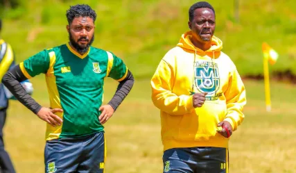 Mohammed Mchulla with Mathare United head coach David Ouma during a training session/HANDOUT