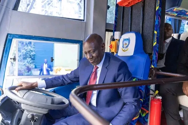 Ruto takes the wheel of Migori Youth FC's new team bus at State House