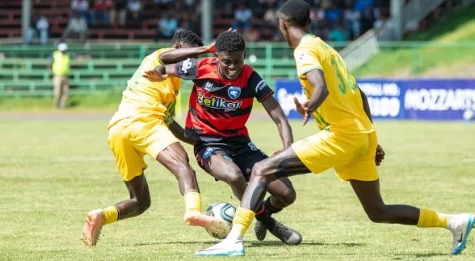 AFC Leopards Kelly Madada tries to dribble past APS Bomet players/ HANDOUT