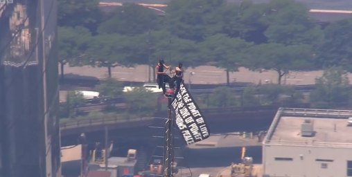 Two people climb to top of NYC's Empire State Building