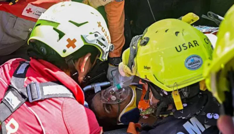 Venezuela quake survivor pulled out alive after eight days