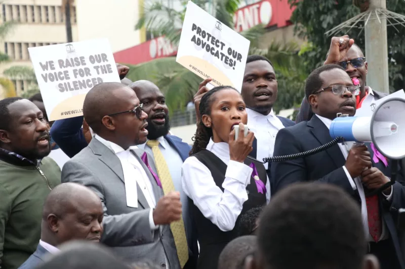Lawyers hold march as killings test rule of law