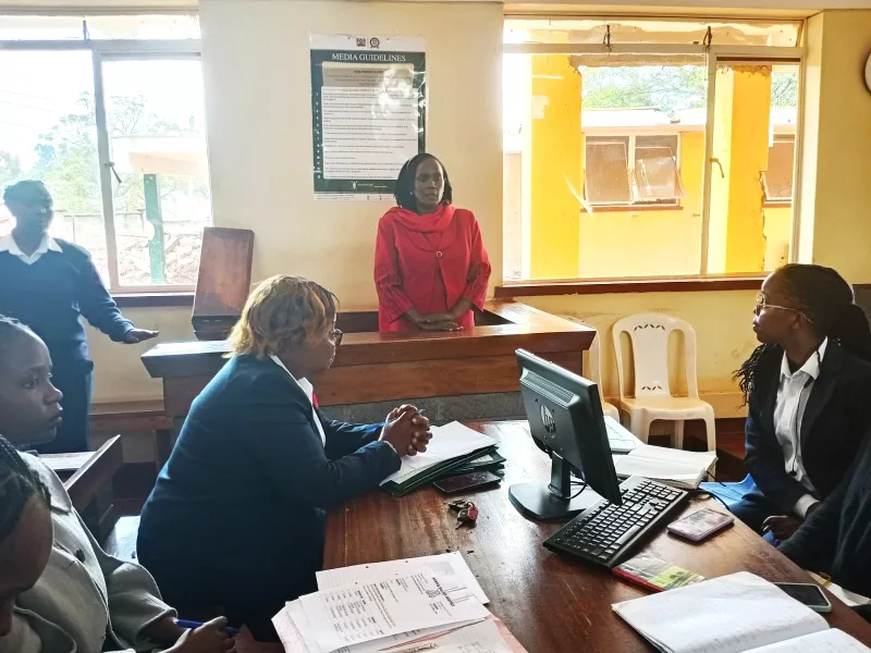 Principal denies assaulting her estranged husband