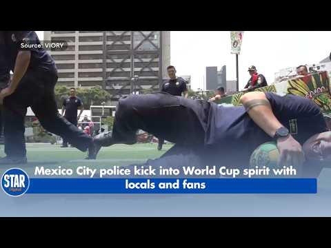 Mexico City Police Kick Into World Cup Spirit With Locals and Fans