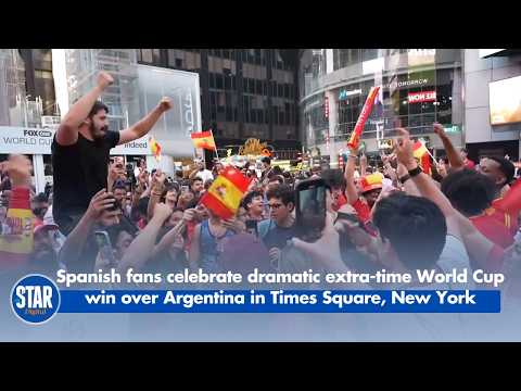 Spanish fans celebrate dramatic extra-time World Cup win over Argentina in Times Square, New York