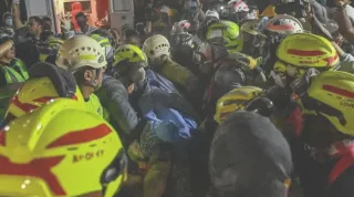 Woman pulled alive from rubble 36 hours after Colombia quake