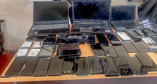 Two nabbed as police recover phones, laptops in Kayole