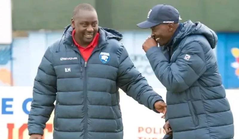 AFC Leopards first assistant coach Bernard Mwalala and head coach Fred Ambani share a light moment during training/HANDOUT