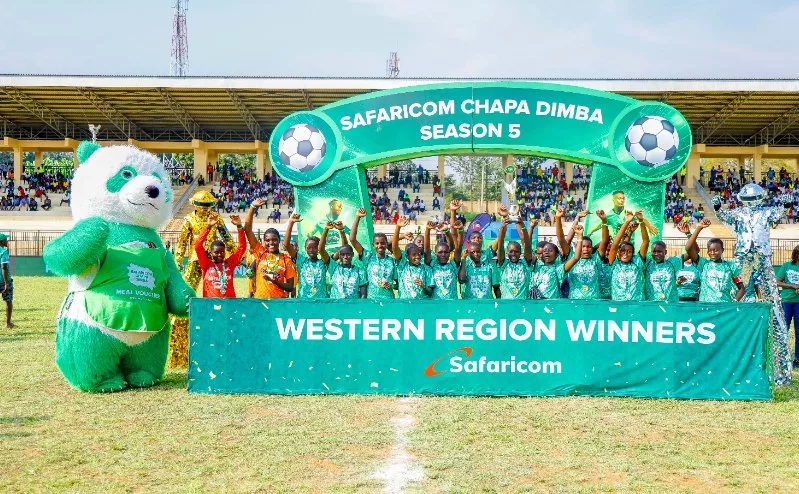 Lugari Progressive Academy players from Kakamega County celebrate after being crowned champions of the girls’ category at the fifth edition of the Safaricom Chapa Dimba Western Region finals at Masinde Muliro Stadium in Kanduyi, Bungoma County.
