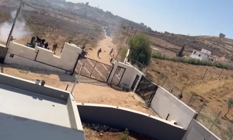 Israeli settlers besieging Palestinian families in West Bank village