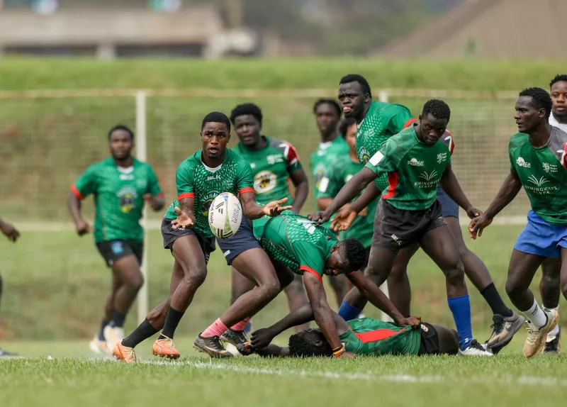 Kenya under 20 scrumhalf Michael Lukusi passes the ball during a training session in Kampala