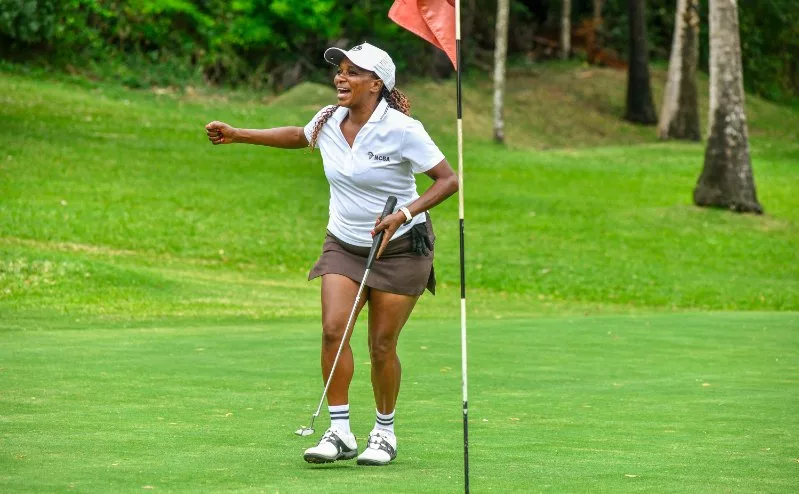 Mary Kandu celebrates defending her Overall Gross Ladies Category at the NCBA Golf Series in Nyali
