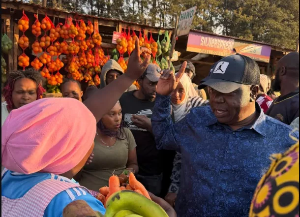 [PHOTOS] Matiang'i mingles with traders during Meru visit
