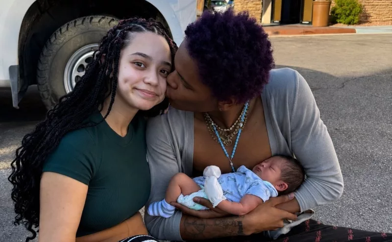 Abba Marcus Mayanja, Angelica Becker and the newborn baby // X