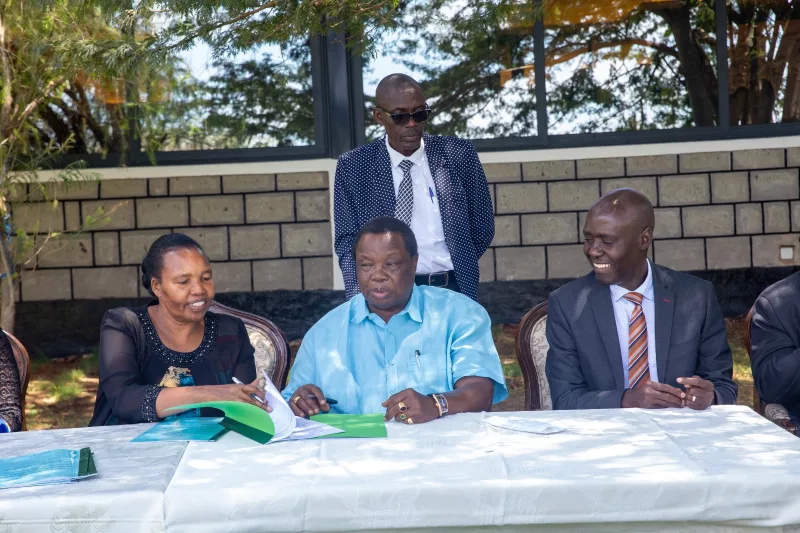Eastern Produce Kenya director Leah Kibii Chirchir and Kenya Plantation and Agricultural Workers Union secretary general Francis Atwoli during the signing of the CBA.