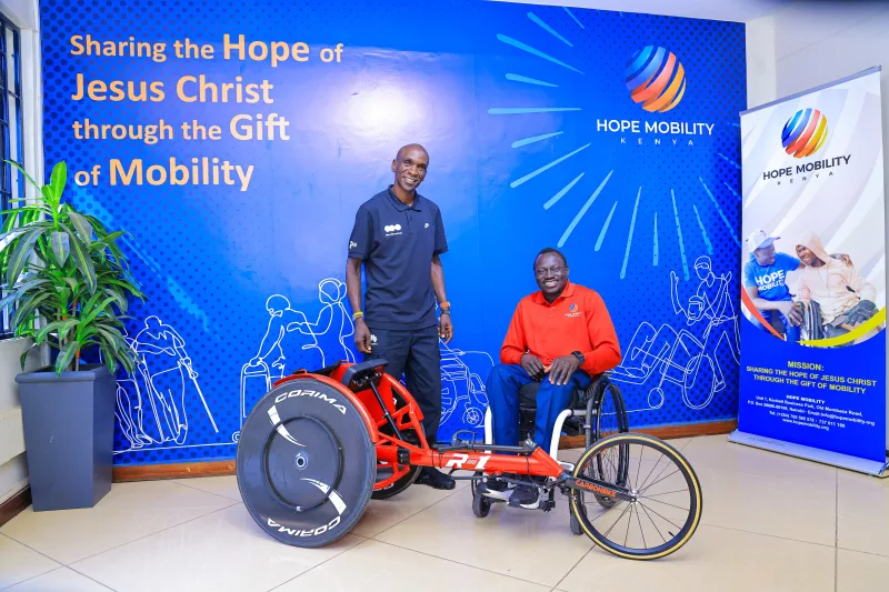 Eliud Kipchoge (L) with Micheal Panther/ HANDOUT
