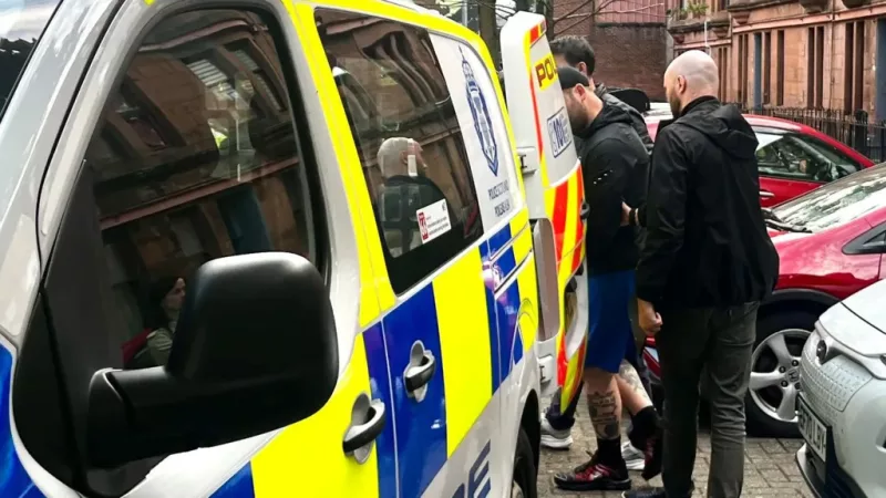 Man, 29, arrested in police raid over racist assault