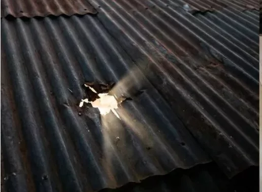 Stray bullet rips through roof, lands beside sleeping couple
