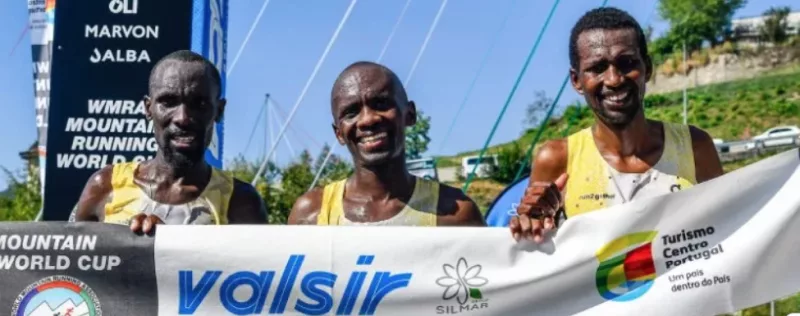 Philemon Kiriago poses for a photo with Patrick Kipng'eno (L) and Michael Saoli (R) after yesterday's race
