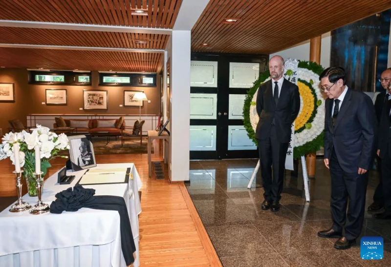 He Wei, vice chairman of China's National People's Congress Standing Committee, mourns the passing of Norway's King Harald V on behalf of the Chinese side and leaves a message on the condolence book at the Norwegian embassy in China in Beijing, capital of China, Sept. 1, 2026. (Xinhua/Chen Yehua)