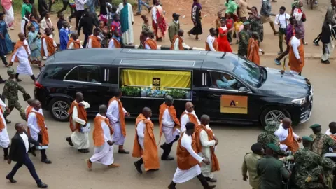 Uganda's King Oyo buried amid calls for unity over his successor