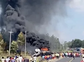 Residents rush to siphon fuel after tanker overturns