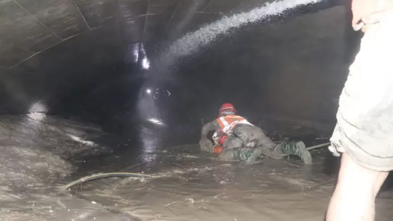 Rescuers found a substantial amount of water in the tunnel as they dug through it