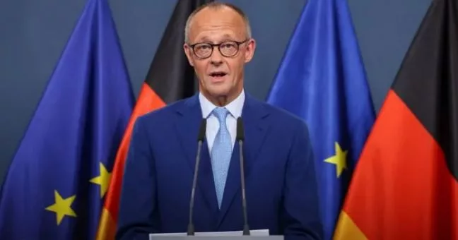 German Chancellor vows to stay despite 'disaster' in polls